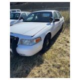 2011 Ford Crown Victoria, Vin#2FABP7BV1BX167676, odometer reads 122,634, Air bag and brake light on. Hail, heavy duty push bumper. Locks will be drilled out.  See description for additional informatio