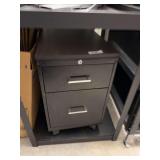 Two drawer metal cabinet on rollers, one drawer, one letter file drawer. No preview.  Pickup will be at the Police Department.