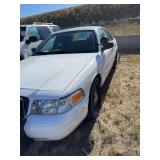 2011 Ford Crown Victoria, Vin#2FABP7BV5BX167681, odometer reads 104,968, air bag light on, locks are drilled, hail, cracked windshield. See description for additional information.  Preview & pickup Fl