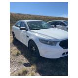 2015 Ford Taurus, Vin#1FAHP2MK6FG126049, odometer reads125,183, will not start, locks are drilled. Heavily broken and cracked windshield, hail. Buyer will need to tow. See description for additional i