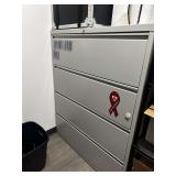 Beige 4 drawer lateral file cabinet 47x18 1/2 x 52 1/2.  No preview.  Pickup will be at the Police Department.