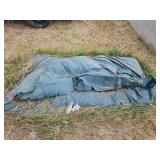 Tarp that appears to have sand in it, Approximately 6.5