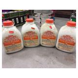 Four like new jugs of data powder, number nine each weigh approximately 2 pounds - from accurate arms company