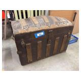 Antique humpback trunk both leather handles intact