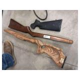 Left-handed Ruger 1022 stock, another wood stock and synthetic stock
