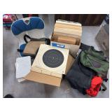 Large amount of paper targets, floor chair, canvas bags