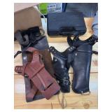 Leather holsters and hard side gun case
