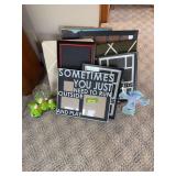 Various picture frames, picture holders and some rainy day ducks