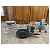 Kitchen items include plates, candle, drinking glasses, sifter, chopper, juicers, etc