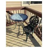 28x30 patio table w tile top and plastic patio chair