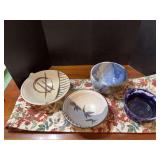 Stoneware bowls and floral pattern table runner