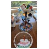 Three fancy glass serving plates