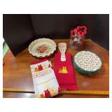 Gingerbread man spoon rest, Pioneer Woman 8.5” plates, hog towels, cookie cutters and Pioneer Woman casserole