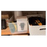 Seagate backup plus, Netgear N300 wireless USB adapter, Coleman lantern battery, LG cellphone, and more