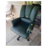 Rolling office/dining/living whatever room you want it to be chair Does have some cracking on arm
