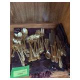 Unsorted & unmatched gold flatware