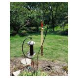 Three shepherds hooks with birdfeeders