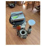 Catch all group includes table, vase, lamp, blanket and DVD player