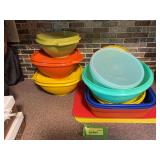 Tupperware storage containers and plastic cutting mats