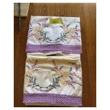 Two pillowcases with very fancy handiwork