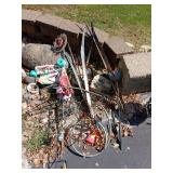 Various yard decor includes flag holders, decorative flowers, etc