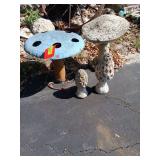 Three cement mushrooms and a metal one 🍄🍄‍🟫