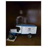 Quaker Oats coin, truck bank and glass bottle
