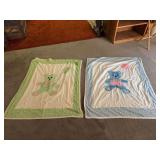 2 tied crib comforters