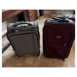 Two rolling suitcases