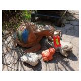 Metal turtle, cement sponge and three frogs