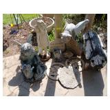 Yard decor of all kinds-wooden pig, broken wing cement gargoyle, stepping stones, etc