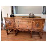22D x 66L x 36H sideboard with drop brass drawer pulls and carved front NO CONTENTS