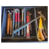 Hammers, flat bars, saws etc...