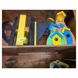 Whimsy bird houses and Hawkeye wood planter