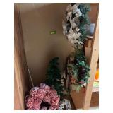 5 wreaths and a small Xmas tree