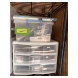 (1) 3 drawer plastic cabinet and small tote of scrapbooking supplies
