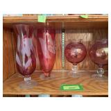 Five cranberry wheel etched vases