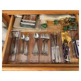 Drawer of holiday flatware, spreaders, napkin holders, etc