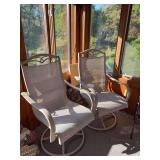 Two rocking stationary patio chairs