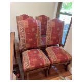 Six padded seat and back dining chairs