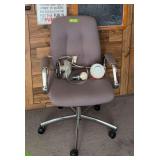 Office chair and desk light, chalkboard and sign