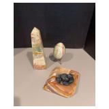 Alabaster egg, ashtray with “ashes” and obelisk