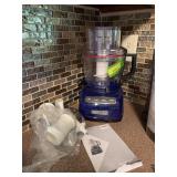 Purple KitchenAid food processor and attachments