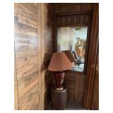 Lamp, nail keg and mirror