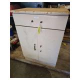 Small base cabinet with oil, garden fluids, elec supplies etc