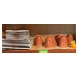 6 Pier 1 coffee cups, set of 8 Tabletops Gallery Multi Paisley pattern salad and dinner plates, and an orange cat