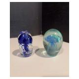 Two jellyfish paperweights