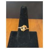 Women’s size 8.5 BHG ring with CZ stone Marked 10K
