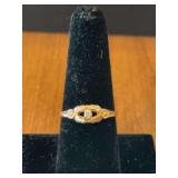 Women’s size 8 BHG ring with diamond Marked 10K
