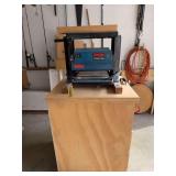 Ryobi 10" surface planer on rolling stand
